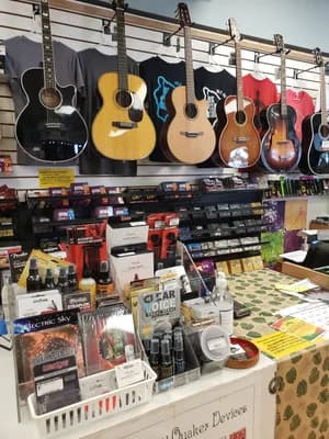 Instruments and gear inside Big Island Guitars, where lessons happen